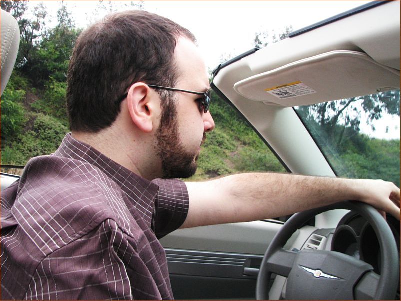 Vinny looking like a true Californian in our convertible on PCH